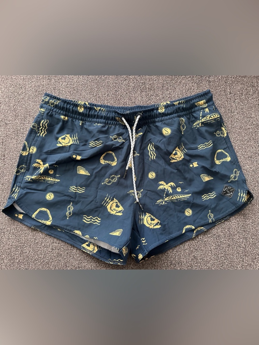 Women’s Salty Crew navy and yellow board shorts